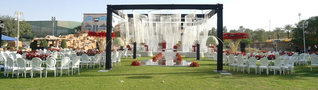 Outdoor wedding stage and seating by Wedmin
